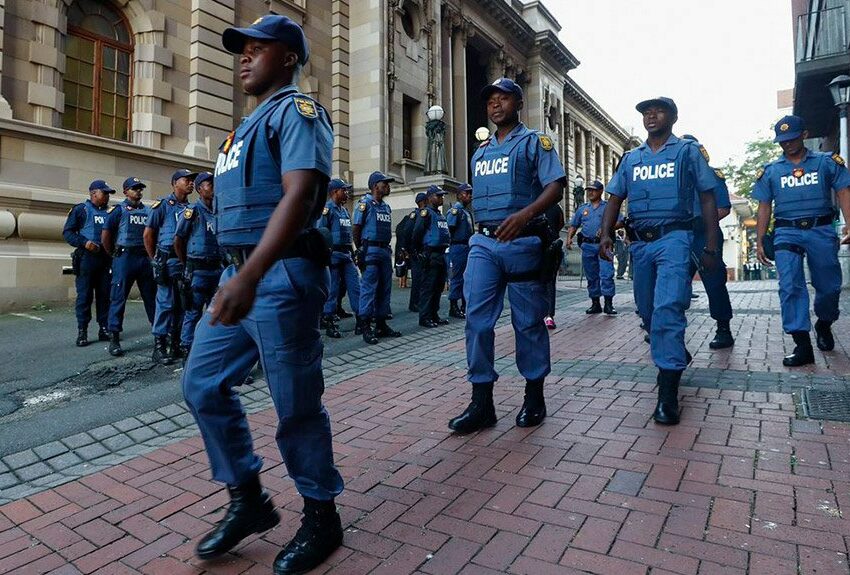 Uniformed SAPS officers dancing, TikTok video of police in amusement, policing culture in South Africa Bona Magazine
