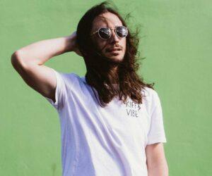 The Kiffness speaking on stage, R500k campaign loss, defending Charlie Kirk post, South African musician controversy, social media reactions, Bona Magazine