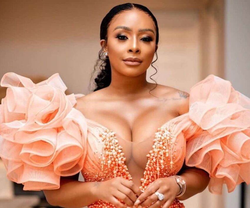 Boity Thulo fragrance bottle, Pink Sapphire perfume, Boity’s product in store, celebrity perfume packaging, Boity Thulo and perfume, discounted perfume bottle, beauty product shelf, Bona Magazine
