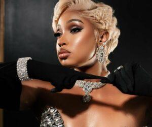 Phuti Khomo at funeral, couture outfit, public mourning debate, South African celebrity, Actress in hat at church, mourning attire controversy, funeral fashion South Africa, public response, Bona Magazine