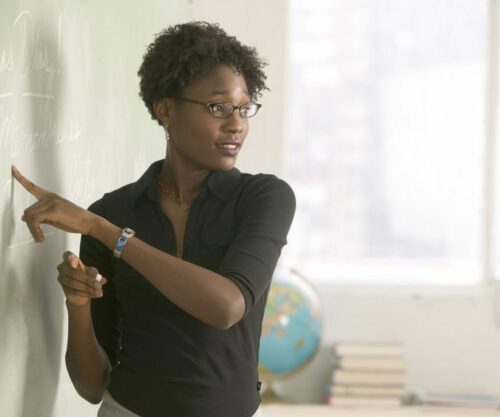 Soweto teacher decorating classroom, classroom transformation, low-income school upliftment, Temu supplies in South Africa, teacher resourcefulness, Bona Magazine