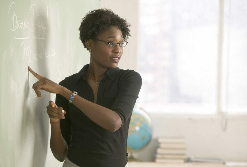 Soweto teacher decorating classroom, classroom transformation, low-income school upliftment, Temu supplies in South Africa, teacher resourcefulness, Bona Magazine