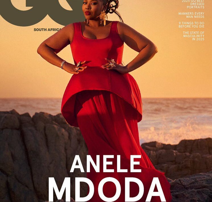 Anele Mdoda red carpet pose, South African magazine cover, media star Johannesburg event, GQ South Africa reveal party, female media pioneer, Bona Magazine