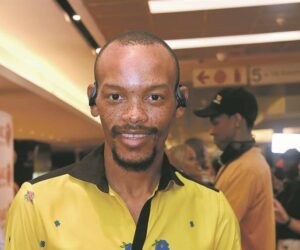 Nota Baloyi portrait South African media personality, Zimbabwe travel corridor passport stamp, South African social media reaction comments Bona Magazine