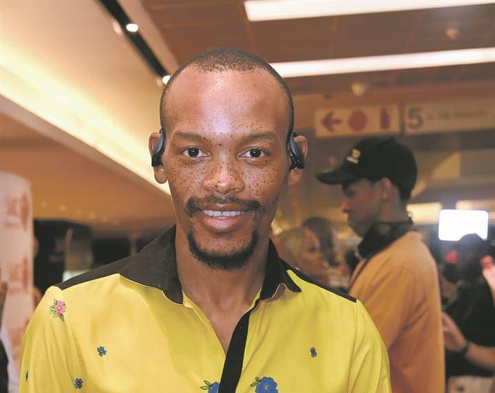 Nota Baloyi portrait South African media personality, Zimbabwe travel corridor passport stamp, South African social media reaction comments Bona Magazine