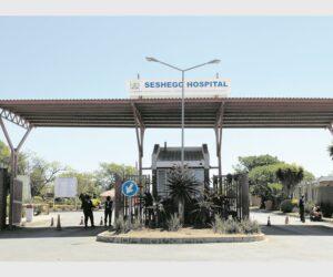 toddler in car seat back of parked car, blue Toyota Corolla Cross parking lot Seshego Hospital, child safety awareness South Africa, Bona Magazine