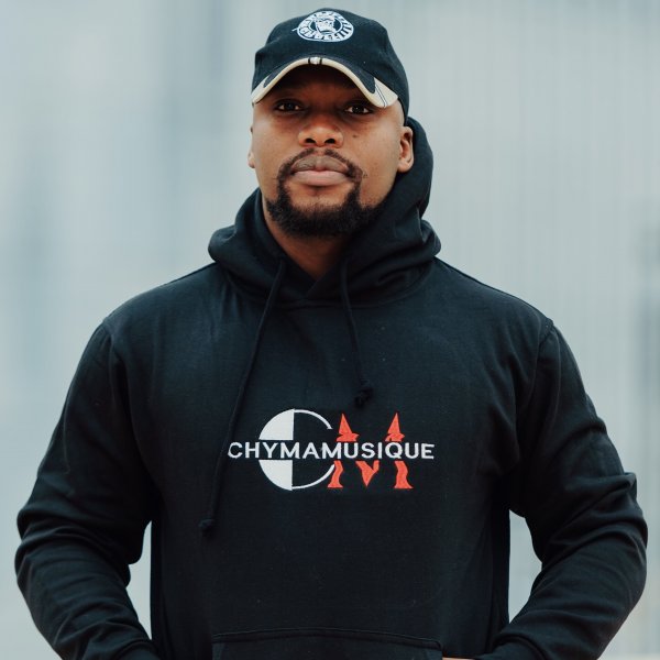 Chymamusique performing under lights, South African DJ return, concert stage comeback, artist healing journey, music revival, Bona Magazine