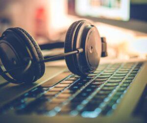 South African rapper holding microphone, English language clarity, Amapiano music pride, cultural identity, viral podcast praise, Bona Magazine