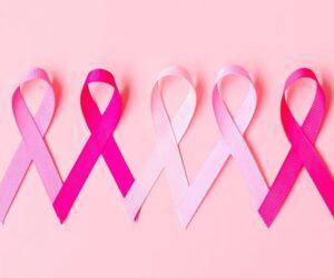 young woman performing breast self-check, health awareness, breast cancer prevention, early detection, Bona Magazine