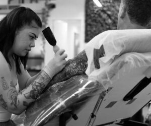 tattoo needle close up, endorphins release, tattoo culture, dopamine rush, body art identity, empowerment tattoos, Bona Magazine