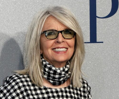 Diane Keaton smiling on red carpet, classic Hollywood actress, Oscar winner tribute, Annie Hall fashion icon, Bona Magazine