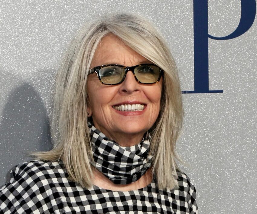 Diane Keaton smiling on red carpet, classic Hollywood actress, Oscar winner tribute, Annie Hall fashion icon, Bona Magazine
