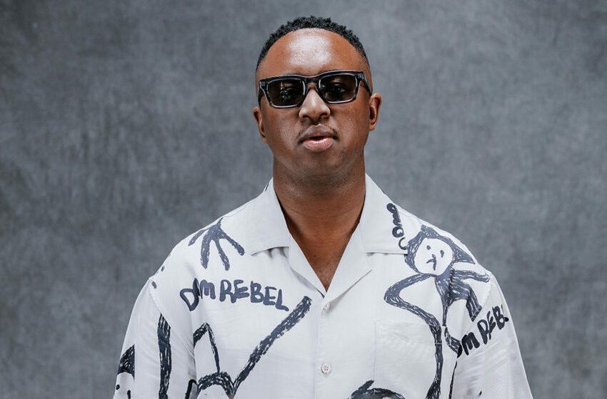 DJ Shimza performing live Johannesburg, Gold Reef City Theme Park exterior Ormonde Johannesburg, South African music festival crowd, Bona Magazine