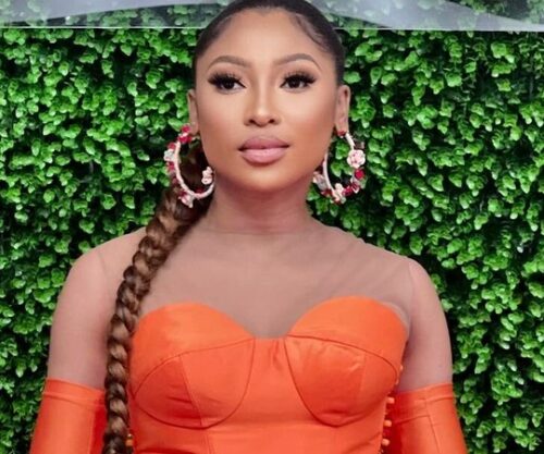 Enhle Mbali Mlotshwa singing on stage, Enhle Mbali Mlotshwa Johannesburg event, Enhle Mbali Mlotshwa celebrity smile, Bona Magazine