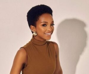 Nandi Madida on stage South Africa, Nandi Madida hosting event Johannesburg, Nandi Madida international summit host image, TIME Africa G20 Impact Summit Johannesburg crowd, TIME Africa G20 Impact Summit global leaders Africa, Johannesburg major summit African leadership stage, Bona Magazine