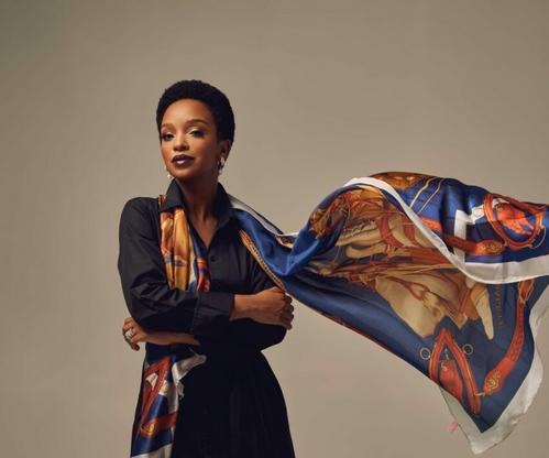 Nandi Madida portrait smiling, South African national anthem sheet music, choir singing Nkosi Sikelel iAfrika history, Bona Magazine