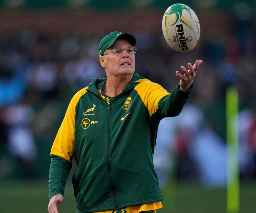 Rassie Erasmus speaking to media, Springboks fans in yellow jerseys waving, South African rugby open training crowd, heartfelt coach message to fans, Bona Magazine