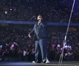 Cassper Nyovest performing live, South African rapper on stage, Cassper Nyovest training for fitness journey, body-shaming response South Africa, motivation through criticism, Bona Magazine