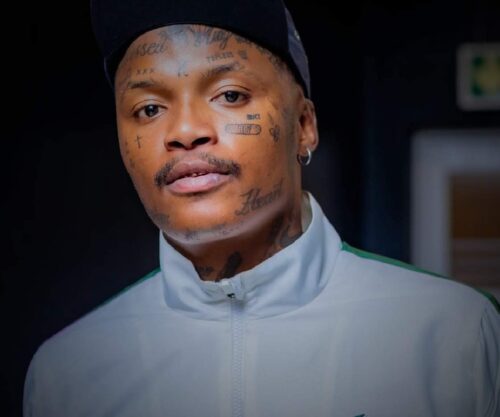 Bona Magazine, Shebeshxt outside court building, Shebeshxt escorted by police, Polokwane Magistrate’s Court entrance, South African rapper court case atmosphere