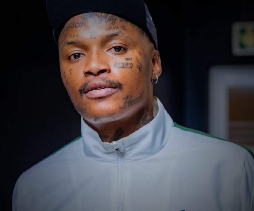 Bona Magazine, Shebeshxt outside court building, Shebeshxt escorted by police, Polokwane Magistrate’s Court entrance, South African rapper court case atmosphere