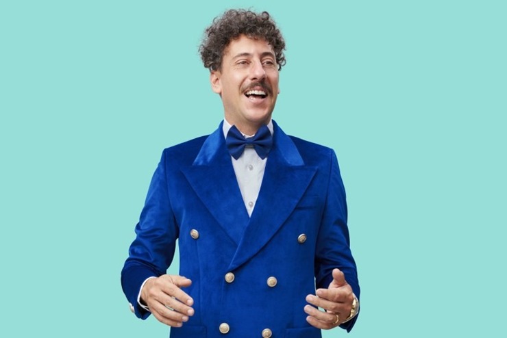 Schalk Bezuidenhout and Helga Vorster smiling together, South African comedian new relationship, Cape West Coast holiday couple photo, celebrity romance South Africa, Bona Magazine