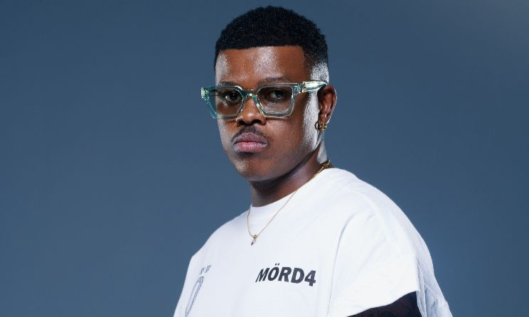 Bona Magazine, Murdah Bongz smiling family photo, Murdah Bongz mother home surprise, South African hip hop artist Murdah Bongz portrait