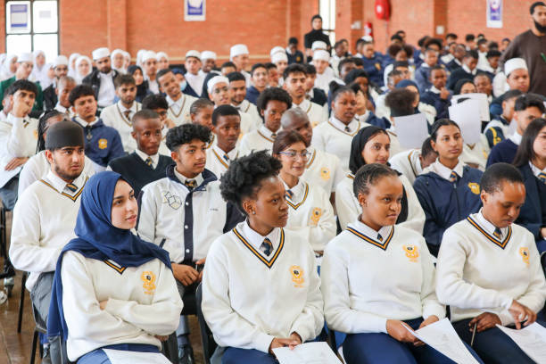 KRUGERSDORP, SOUTH AFRICA - OCTOBER 18: Matric pupils at the official National Senior Certificate (NSC) Pledge Signing Ceremony at Ahmed Timor Secondary School on October 18, 2024 in Krugersdorp, South Africa. The Matric Exam Pledge is a vital moment of commitment for the Class of 2024, marking their dedication to academic integrity, honesty, and discipline as they approach their final National Senior Certificate (NSC) exams. (Photo by Fani Mahuntsi/Gallo Images via Getty Images)