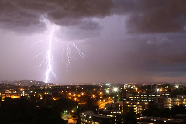 TOPSHOT - Lightenings strike over Johannesburg during a storm on December 14, 2013. AFP PHOTO / ALEXANDER JOE (Photo by ALEXANDER JOE / AFP) (Photo by ALEXANDER JOE/AFP via Getty Images)