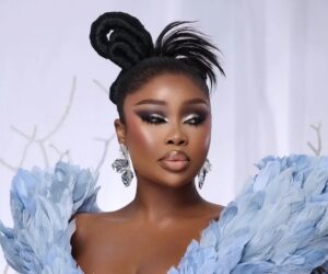 Sithelo Shozi carrying a Bottega Veneta Andiamo handbag, Sithelo Shozi stylish dress Johannesburg, Sithelo Shozi influencer portrait South Africa, Bona Magazine