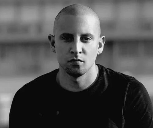 DJ Warras fashion style, DJ Warras black suit, DJ Warras casual outfits, South African DJ style, Bona Magazine, DJ Warras Live AMP look, DJ Warras leather jacket style, DJ Warras sneakers and jeans, men’s fashion South Africa, Bona Magazine