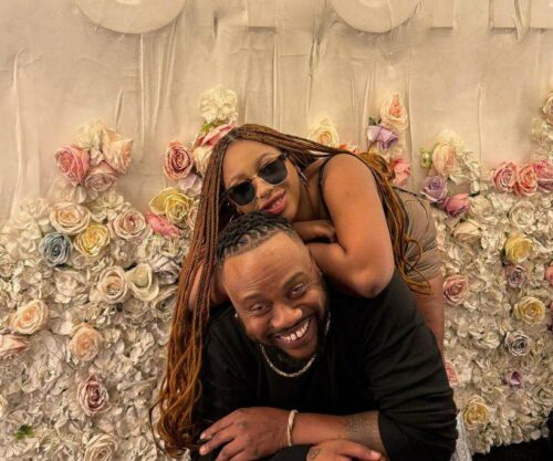 Gigi Lamayne smiling with Sizwe Alakine, couple video reaction, playful relationship moment, social media buzz, South African celebrities, young couple laughter, Bona Magazine