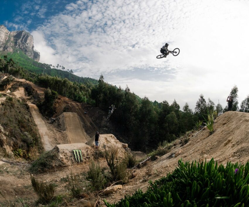 Darkfest 2026 jumps, freeride MTB Stellenbosch, Hellsend Dirt Compound riders, massive dirt jumps South Africa, Vuurberg Farm mountain biking, Théo Erlangsen Darkfest, Sam Reynolds Darkfest event, Falcon Heavy jump MTB, Rocket jump Darkfest, extreme mountain biking tricks, Darkfest awards winners, freeride MTB tricks South Africa, MTB athletes action shots, dirt jump competition 2026, Bona Magazine