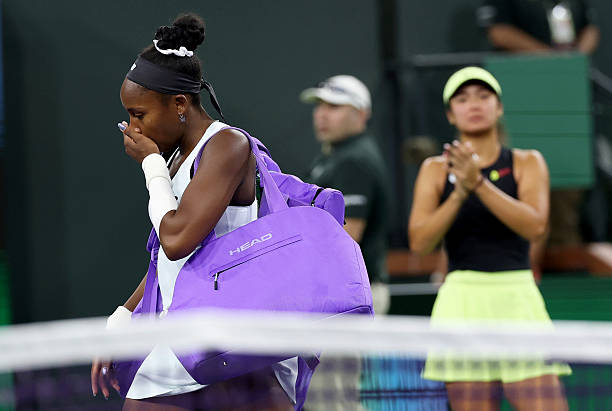 INDIAN WELLS, CALIFORNIA - MARCH 08: Coco Gauff of the United States walks off court showing her emotion after she has retired with an arm injury against Alexandra Eala of the Phiippines during their third round match of the BNP Paribas Open at Indian Wells Tennis Garden on March 08, 2026 in Indian Wells, California. (Photo by Clive Brunskill/Getty Images)