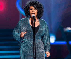 Jill Scott singer live performance, Jill Scott R&B artist portrait, Jill Scott neo soul singer stage, Jill Scott concert crowd performance, Jill Scott To Whom This May Concern tour, Jill Scott SunBet Arena Pretoria concert, Jill Scott GrandWest Arena Cape Town show, Jill Scott Grammy winning R&B artist, Jill Scott soul music live show, Jill Scott international tour announcement, Bona Magazine