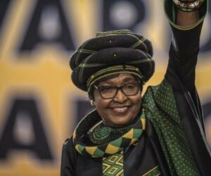 The former wife of the late South African President Nelson Mandela, anti-apartheid campaigner Winnie Mandela waves as she attends the 54th ANC National Conference at the NASREC Expo Centre in Johannesburg on December 16, 2017. Thousands of delegates from South Africa's ANC party gathered on December 16, 2017 for a five-day meeting to elect their new leader in a divisive race seen as a pivotal moment in the country's post-apartheid history. he winner will be well placed to be the next president, but the ANC has lost much popularity since Nelson Mandela led it to power in the euphoric 1994 election that marked the end of white-minority rule. / AFP PHOTO / MUJAHID SAFODIEN (Photo credit should read MUJAHID SAFODIEN/AFP via Getty Images)