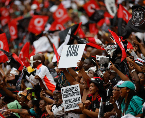 Orlando Pirates fans celebrate their team's win during the Premier Soccer League (PSL) South African Premier Division football match between Orlando Pirates and Kaizer Chiefs at the FNB Stadium in Johannesburg on February 1, 2025. (Photo by Phill Magakoe / AFP) (Photo by PHILL MAGAKOE/AFP via Getty Images)