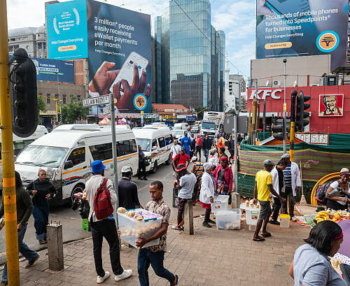 Caption Traffic near street vendors in the central business district in Johannesburg, South Africa, on Wednesday, Feb. 18, 2026. South Africa's unemployment rate dropped to the lowest level in more than five years in the fourth quarter, as the community and social services and construction sectors added workers. Photographer: Leon Sadiki/Bloomberg via Getty Images Description File URL: