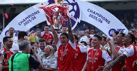 Arsenal's Italian defender #33 Riccardo Calafiori lifts the Premier League trophy at a presentation ceremony on the pitch after the English Premier League football match between Crystal Palace and Arsenal at Selhurst Park in south London on May 24, 2026. Arsenal are English league champions for the first time since 2004, winning the league by seven points. (Photo by Adrian Dennis / AFP via Getty Images) / RESTRICTED TO EDITORIAL USE. No use with unauthorized audio, video, data, fixture lists, club/league logos or 'live' services. Online in-match use limited to 120 images. An additional 40 images may be used in extra time. No video emulation. Social media in-match use limited to 120 images. An additional 40 images may be used in extra time. No use in betting publications, games or single club/league/player publications. /