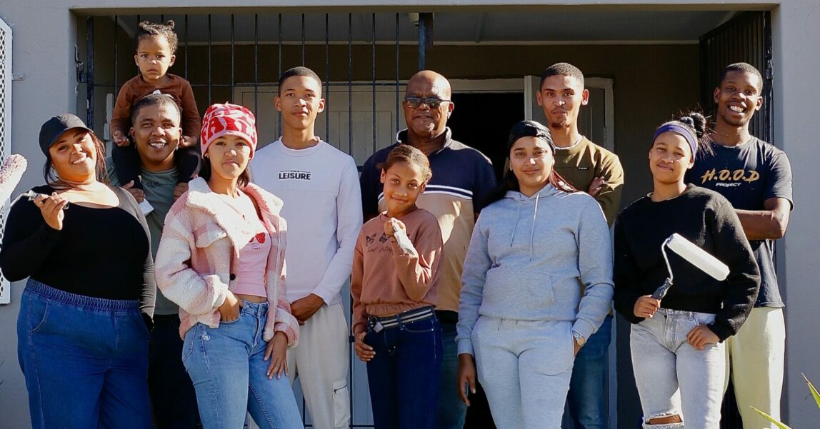 Cape Flats youth paint the walls in their area.
