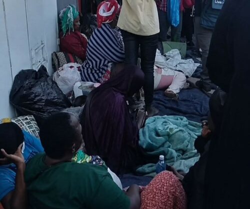 Migrants camped outside Home Affairs offices.