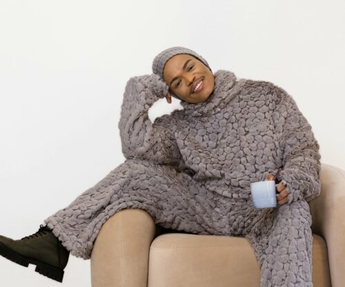 Somizi showed himself cooking with a fan.