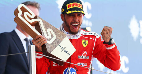 BARCELONA, SPAIN - JUNE 14: Race winner Lewis Hamilton of Great Britain and Scuderia Ferrari celebrates on the podium with his trophy during the F1 Grand Prix of Barcelona-Catalunya at Circuit de Barcelona-Catalunya on June 14, 2026 in Barcelona, Spain. (Photo by Clive Mason/Getty Images)