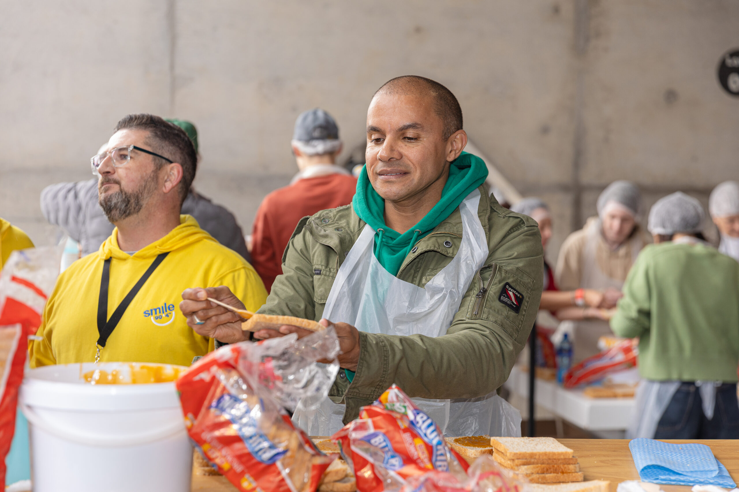 Anwar McKay making sandwiches.